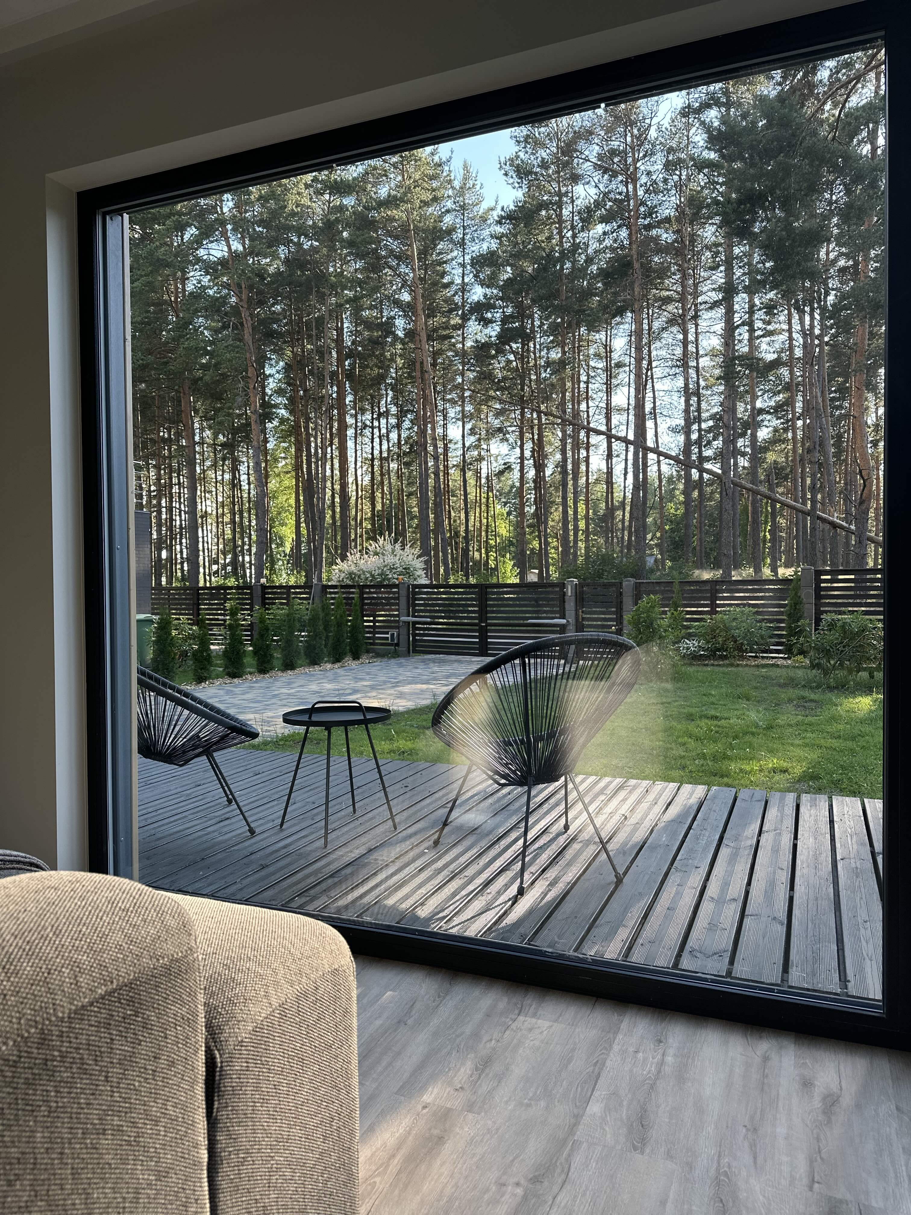 CHALET bedroom with forest window
